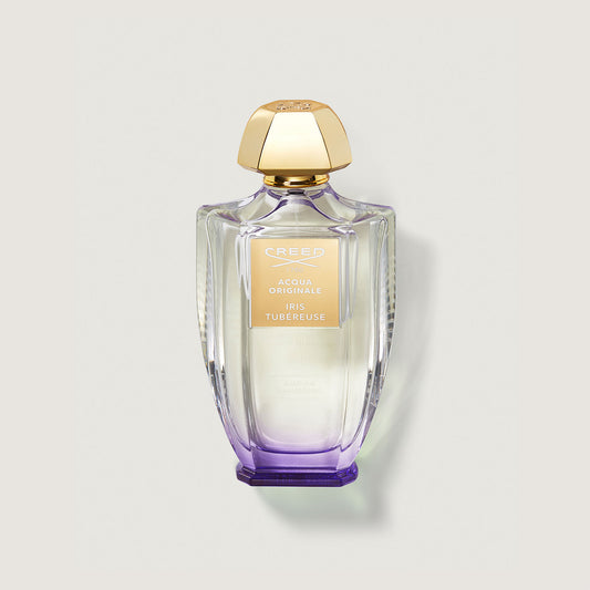 Iris Rubereuse 100ml Bottle with gold cap and purple tinge at bottom 