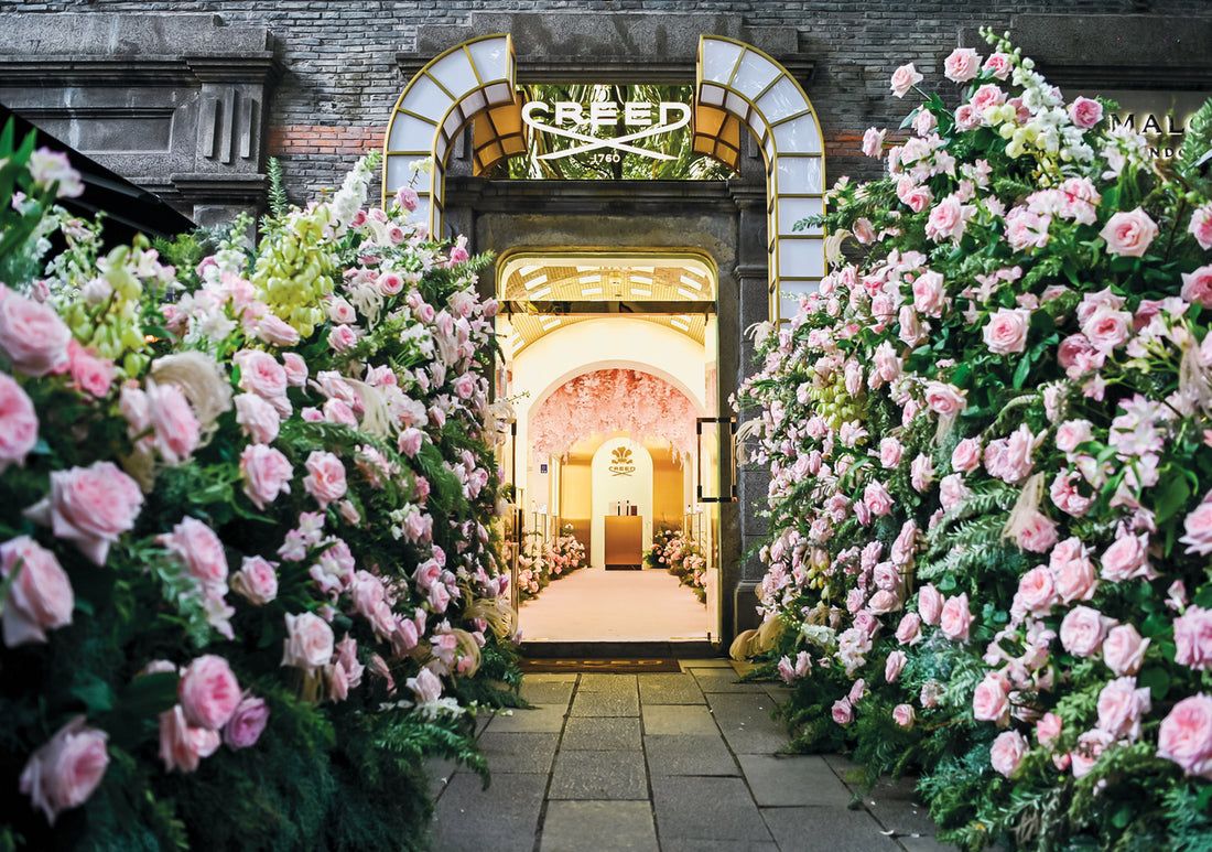 Outside the Shanghai creed boutique where a tunnel of flowers leads to the door