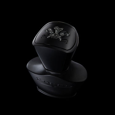 birds eye view of black bottle with black cap 