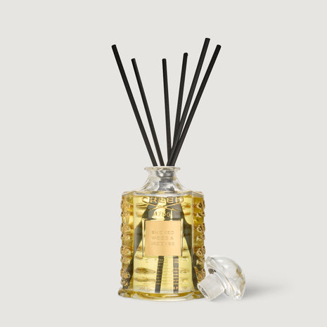 Amber Glass Reed Diffuser with Gold Detail, Black Reeds - Front View | Creed Fragrances