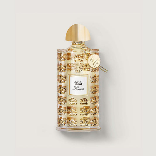 75ml bottle of white flowers fragrance with gold medallion and  decorated bottle with embossed gold fleur de lis